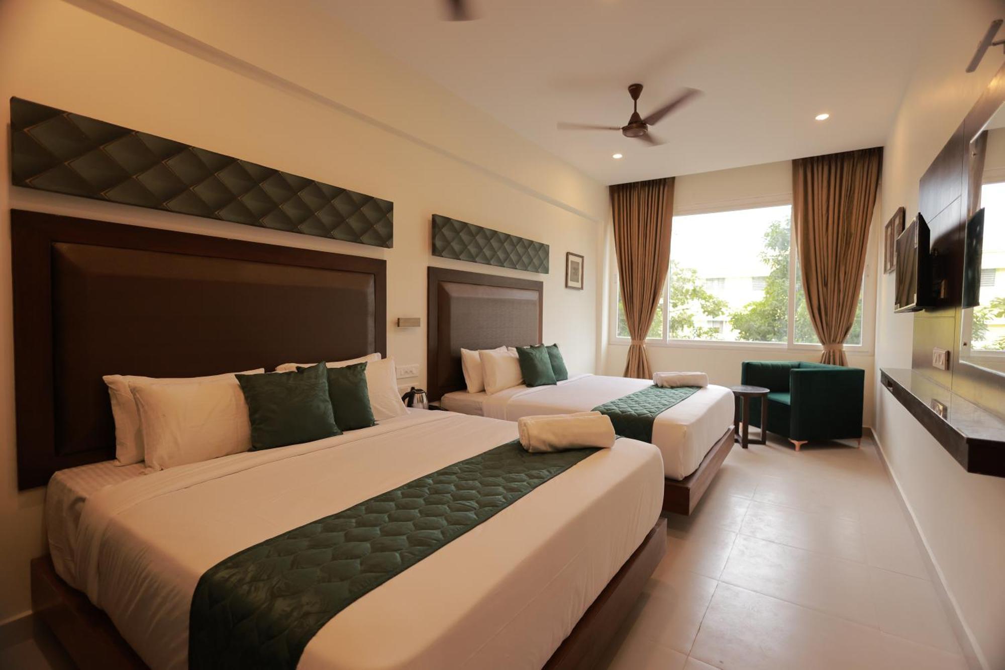 Hotel Aavudai Grand Aralvaimozhi Extérieur photo