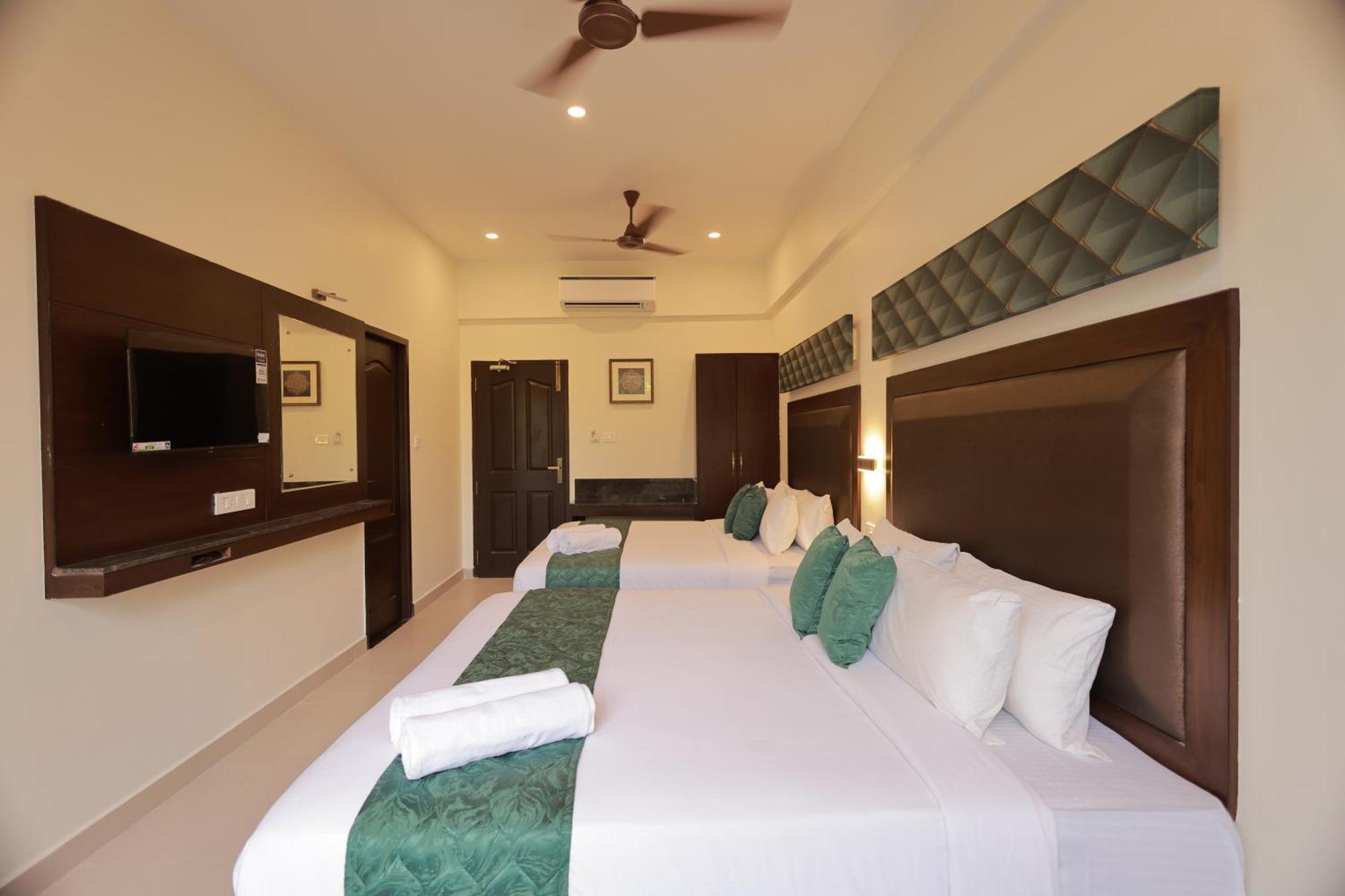 Hotel Aavudai Grand Aralvaimozhi Extérieur photo
